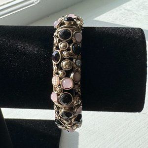 Bangle bracelet with gold, pink and black stones
